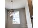 Elegant light fixture in a stairwell at 822 N Rocky River Rd, Monroe, NC 28110