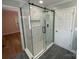 Elegant bathroom with a frameless glass shower and marble tile at 647 Reeves Ct, Charlotte, NC 28208