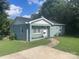 Ranch style home with newly painted exterior and landscaping at 647 Reeves Ct, Charlotte, NC 28208