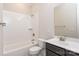 Bathroom with shower, toilet and dark vanity at 1025 Patterson Farm Rd, Mooresville, NC 28115
