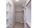 Spacious walk-in closet with ample shelving and hanging rods at 1025 Patterson Farm Rd, Mooresville, NC 28115