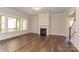 Living room with hardwood floors, fireplace and natural light at 1025 Patterson Farm Rd, Mooresville, NC 28115