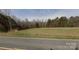 Vacant lot with road frontage and wooded area at 1025 Patterson Farm Rd, Mooresville, NC 28115
