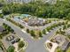 Aerial view of community amenities including pool and tennis courts at 16015 Vale Ridge Dr # 133, Charlotte, NC 28278