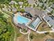 Aerial view of community pool, clubhouse and surrounding homes at 16015 Vale Ridge Dr # 133, Charlotte, NC 28278