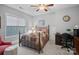 Cozy bedroom with a metal bed frame and built-in workspace at 16015 Vale Ridge Dr # 133, Charlotte, NC 28278