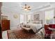 Bright main bedroom with a king-size bed and ample space at 16015 Vale Ridge Dr # 133, Charlotte, NC 28278