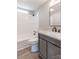 Bathroom featuring a tub and shower, gray vanity with marbled countertop, and a toilet at 55 Shannon Park Cir, Taylorsville, NC 28681