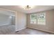Bedroom featuring hardwood floors, recessed lighting, and two windows with natural light at 55 Shannon Park Cir, Taylorsville, NC 28681