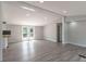 Spacious open-concept living area with access to the outdoor deck at 55 Shannon Park Cir, Taylorsville, NC 28681