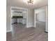 Spacious living room with light-colored wood flooring and a view into the kitchen at 55 Shannon Park Cir, Taylorsville, NC 28681