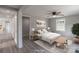 Serene main bedroom with neutral decor, ceiling fan, and natural light at 55 Shannon Park Cir, Taylorsville, NC 28681