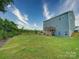 Spacious backyard with grassy area and home at 209 Meyers Ridge Rd, Cramerton, NC 28032