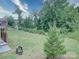 Large backyard with grassy area and deck at 209 Meyers Ridge Rd, Cramerton, NC 28032