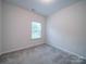 Bright bedroom with carpet and a window at 209 Meyers Ridge Rd, Cramerton, NC 28032