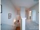 Upstairs hallway with carpet flooring and access to bedrooms and bath at 209 Meyers Ridge Rd, Cramerton, NC 28032