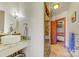 Bathroom featuring a vessel sink, granite counters, modern lighting, and tiled shower at 301 Agnew Rd, Mooresville, NC 28117