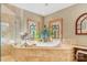 Elegant bathtub with a tile surround, stained glass windows, and a garden view at 301 Agnew Rd, Mooresville, NC 28117