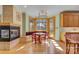 Bright breakfast nook featuring a fireplace, built-in bench seating, and access to the outside at 301 Agnew Rd, Mooresville, NC 28117