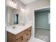 Double vanity bathroom with modern light fixtures at 1511 28Th Street Se Pl, Hickory, NC 28602