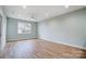 Spacious living room with hardwood floors and ceiling fan at 1511 28Th Street Se Pl, Hickory, NC 28602