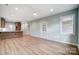 Open living space with hardwood floors and access to rear patio at 1511 28Th Street Se Pl, Hickory, NC 28602