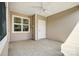 Covered patio with ceiling fan and storage at 1511 28Th Street Se Pl, Hickory, NC 28602