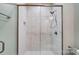 Walk-in shower with marble-look tile at 1511 28Th Street Se Pl, Hickory, NC 28602