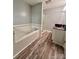Modern bathroom with a soaking tub, glass shower enclosure, and double sink vanity at 1586 Kenlane Dr, Hickory, NC 28601