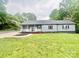 Charming single-story home with well-maintained lawn and inviting front porch at 1586 Kenlane Dr, Hickory, NC 28601