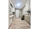 Bright laundry room featuring new appliances and a shiplap wall at 1586 Kenlane Dr, Hickory, NC 28601