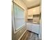 Bright laundry room featuring ample storage, a sink, and a window with natural light at 1586 Kenlane Dr, Hickory, NC 28601