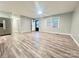 Bright living room with hardwood floors and ample natural light from a large window at 1586 Kenlane Dr, Hickory, NC 28601
