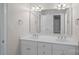 Double vanity bathroom with updated fixtures and mirrors at 170 Old Post Rd, Mooresville, NC 28117