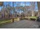 Wooden deck overlooks a wooded backyard at 170 Old Post Rd, Mooresville, NC 28117