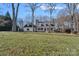 Two-story house with a covered porch and lush lawn at 170 Old Post Rd, Mooresville, NC 28117