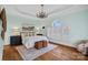 Main bedroom with hardwood floors, large windows, and tranquil color scheme at 170 Old Post Rd, Mooresville, NC 28117