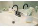 Modern bathroom vanity with black faucet at 609 Rowan Mills Rd, Salisbury, NC 28147