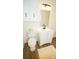 Clean bathroom with white vanity and toilet at 609 Rowan Mills Rd, Salisbury, NC 28147