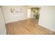 Light-filled dining area with wood-look floors at 609 Rowan Mills Rd, Salisbury, NC 28147