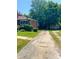 Brick ranch house with a long driveway and detached garage at 609 Rowan Mills Rd, Salisbury, NC 28147