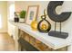 Stylish mantel with decorative objects; adds character to the living space at 609 Rowan Mills Rd, Salisbury, NC 28147