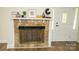 Stone fireplace with glass doors; creates a cozy focal point at 609 Rowan Mills Rd, Salisbury, NC 28147