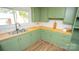 Updated kitchen, green cabinets, butcher block countertops at 609 Rowan Mills Rd, Salisbury, NC 28147