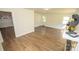 Living room with hardwood floors and access to other rooms at 609 Rowan Mills Rd, Salisbury, NC 28147