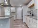 Renovated kitchen, featuring granite countertops and stainless steel appliances at 2626 Abelwood Rd, Charlotte, NC 28216