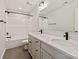 Bathroom featuring a double sink, white tub and white countertops, toilet and gray flooring at 4808 Glen Stripe Dr # Cal0036, Indian Trail, NC 28079