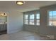 Bright bedroom with multiple windows offering views of the surrounding neighborhood at 4808 Glen Stripe Dr # Cal0036, Indian Trail, NC 28079