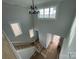 Overhead view of a home's entryway with staircase, windows, and view into the bright open living space at 4808 Glen Stripe Dr # Cal0036, Indian Trail, NC 28079