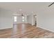 Bright living room featuring hardwood floors, natural light and a ceiling fan at 4808 Glen Stripe Dr # Cal0036, Indian Trail, NC 28079